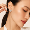 The Blooming Heart Diamond Studs — model close-up