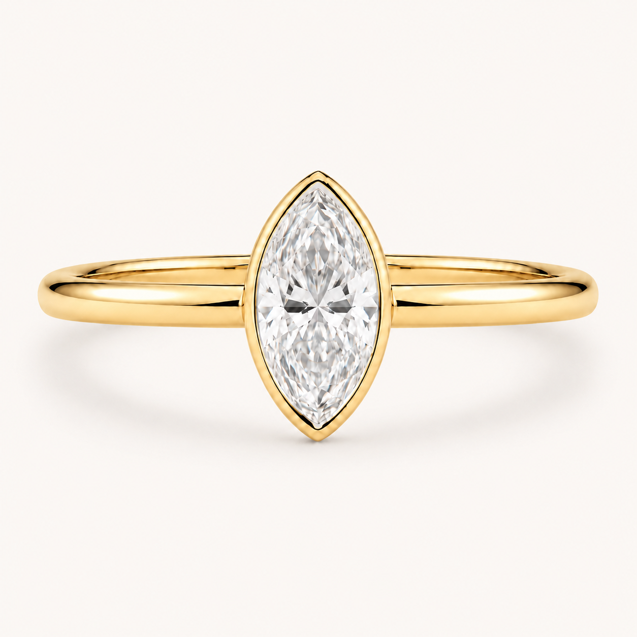 Marquise Bezel Solitaire Ring in Yellow Gold