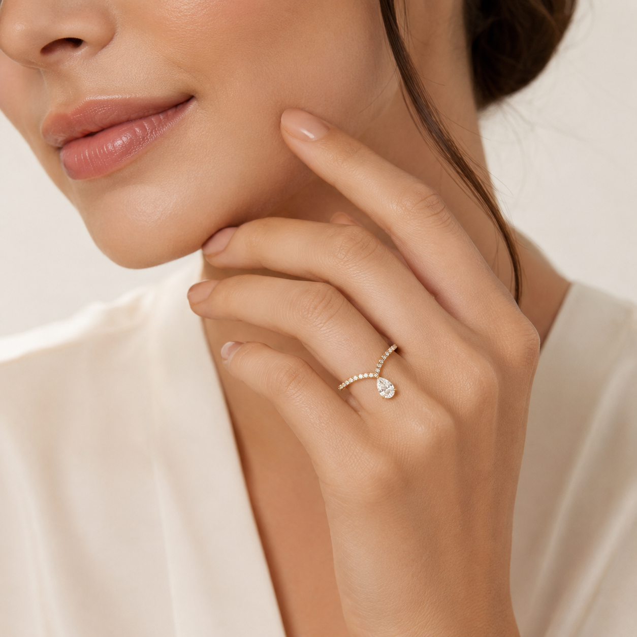 Modern Pear Solitaire Ring worn — front view