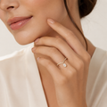 Modern Pear Solitaire Ring worn — front view