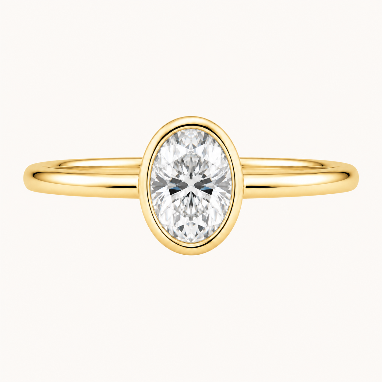 Oval Bezel Solitaire Ring in Yellow Gold