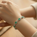 The Oval Emerald Link Bracelet — model view