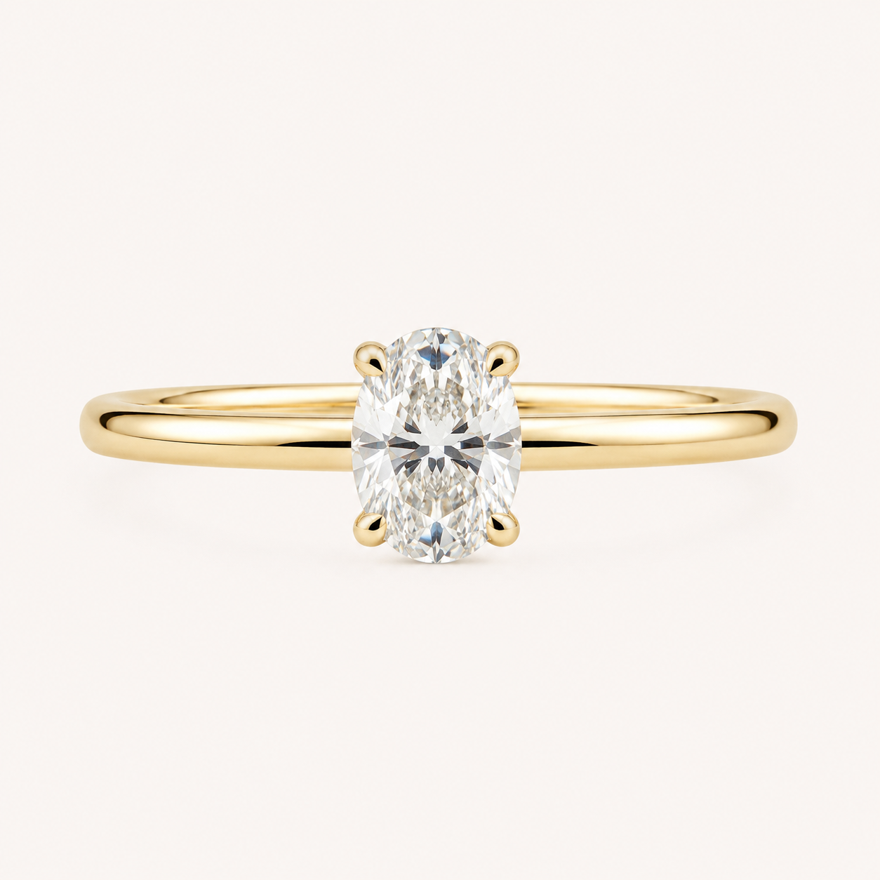 Oval Solitaire Diamond Ring in Yellow Gold