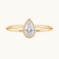 Pear Bezel Solitaire Ring in Yellow Gold