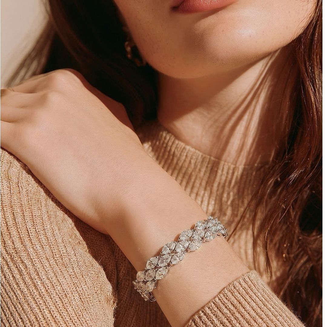 The Seraphine Wave Bracelet — model close-up