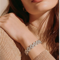 The Seraphine Wave Bracelet — model close-up